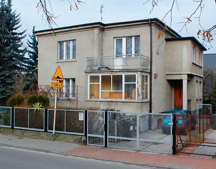 Typical Polish house and family